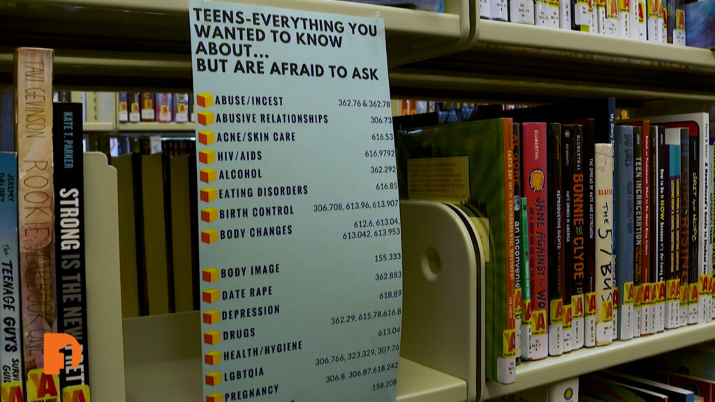 list of teen topics on display at a library